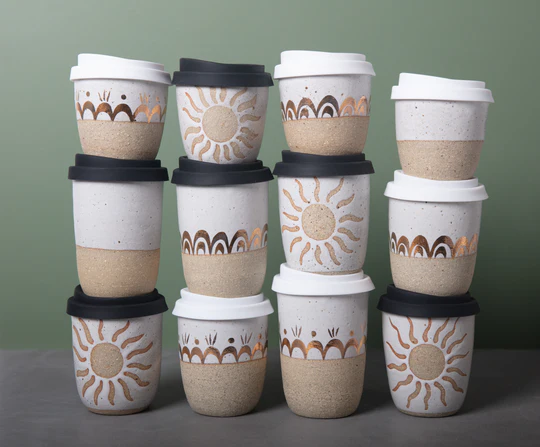 ceramic travel mugs with silicone lids stacked